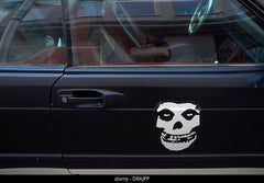 Sticker of a human skeleton on the side of a car Die Cut Vinyl Decal