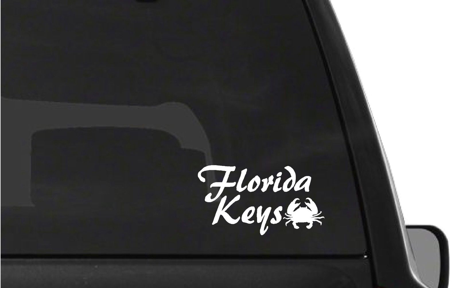 florida‑keys‑vinyl‑sticker‑applied‑on‑car‑window‑and‑laptop